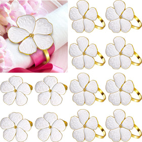 Patelai white flower napkin rings with gold finish for wedding tables.