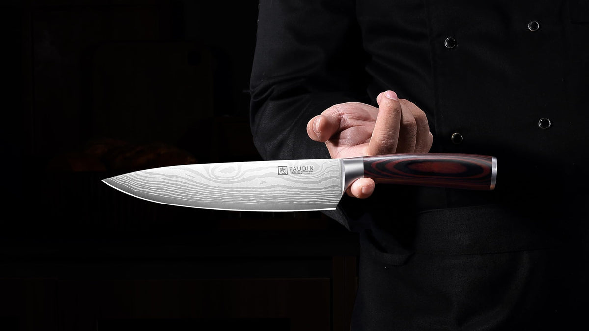 PAUDIN knife in kitchen scene demonstrating everyday versatility.