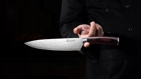 PAUDIN knife in kitchen scene demonstrating everyday versatility.