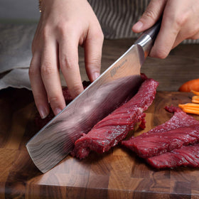 PAUDIN Nakiri 7-inch multipurpose kitchen knife for home cooks.