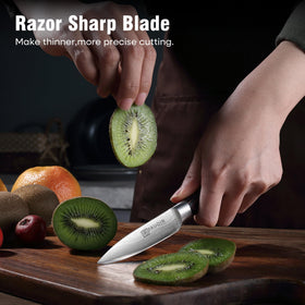PAUDIN paring knife in hand demonstrates ergonomic balance for precise cuts.