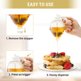 PAULSWAY honey dispenser with stand for easy, steady table serving.