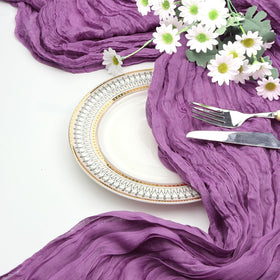 Pepmily purple runner on a party setup creates soft, flattering lighting.