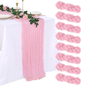 pepmily pink cheesecloth table runner adds subtle elegance to 120-inch tables for weddings.