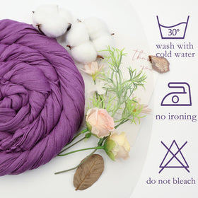 Pepmily purple cheesecloth runner styled on wedding table for romantic ambiance.