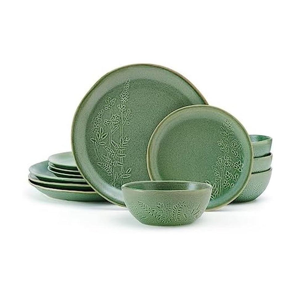 Pfaltzgraff Carrie green dinner plate with debossed floral motif for garden-inspired dining.