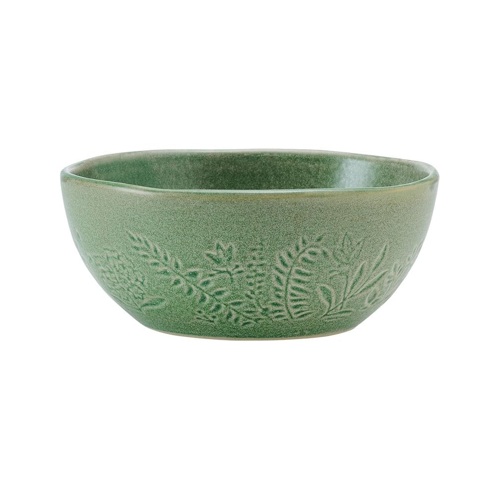 Pfaltzgraff Carrie green service-for-four set displayed on a modern table.
