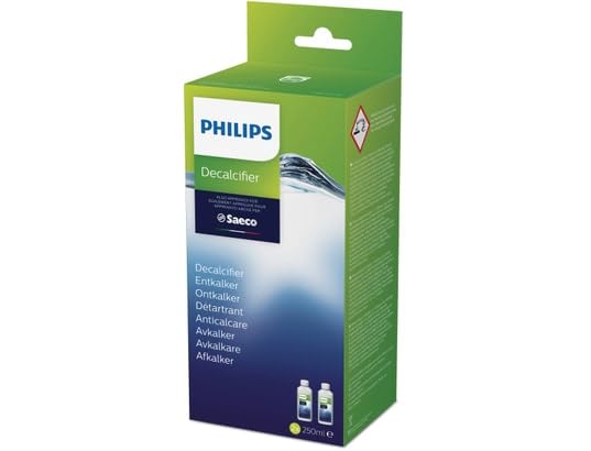 Philips descaler bottle pour action demonstrating safe cleaning of coffee system.