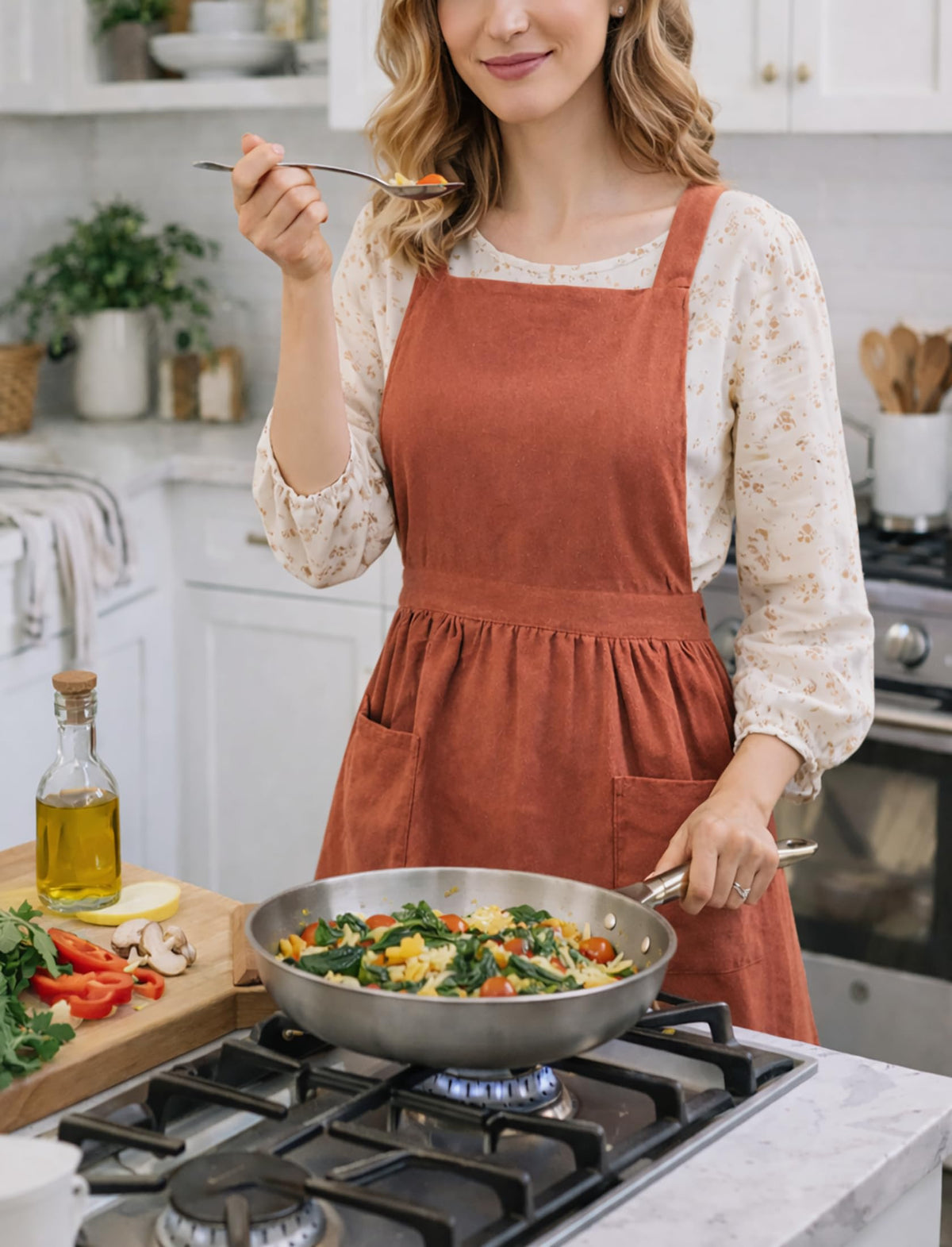Pinknoke burnt orange apron pockets for convenient on-hand essentials.