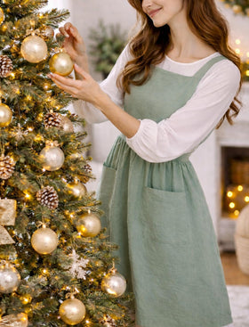 Pinknoke cotton linen pinafore waist strap length supports comfortable fit.