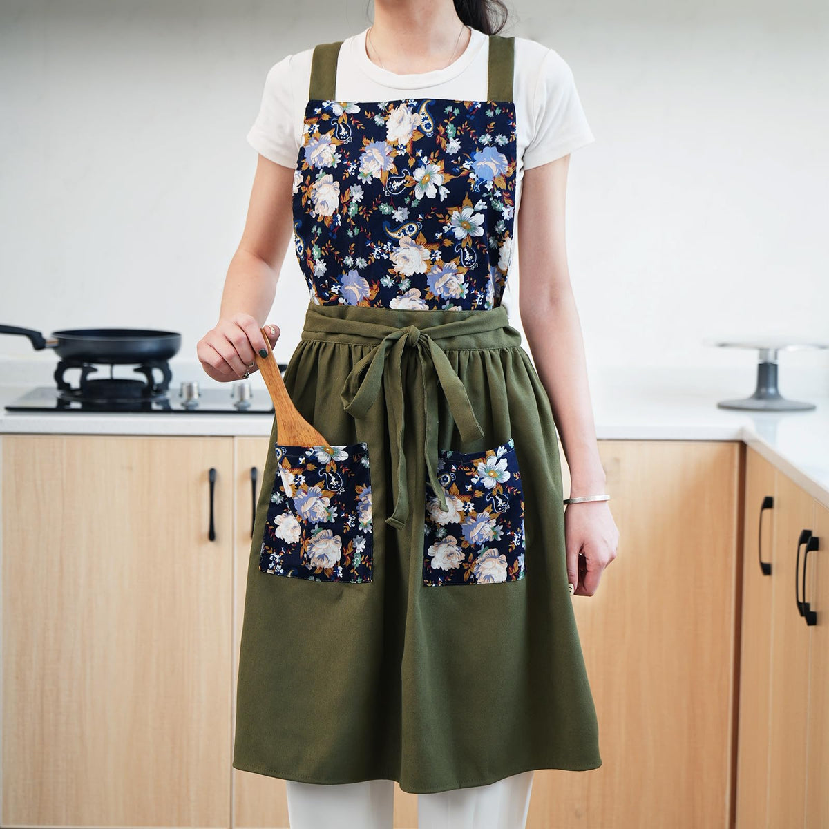 Pinknoke Vintage apron shown in kitchen or garden setting.