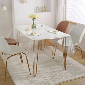 Pioggia clear tablecloth protector rectangle outdoor dining showing spill resistance.