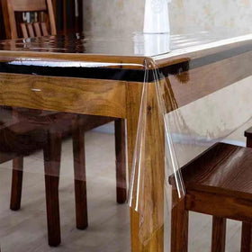Pioggia clear tablecloth protector rectangle top view for elegant indoor dining.