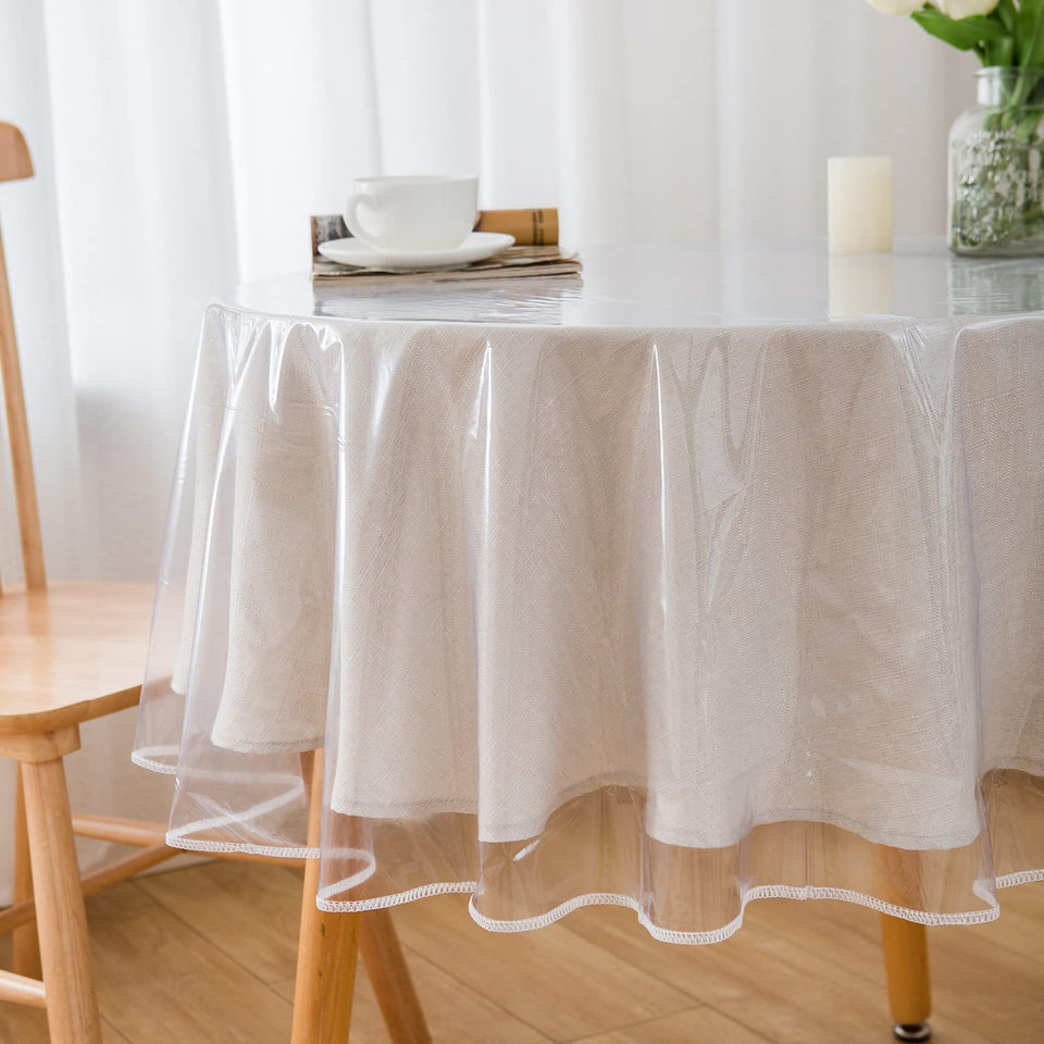 Pioggia clear vinyl round tablecloth showing table setup while protecting from spills