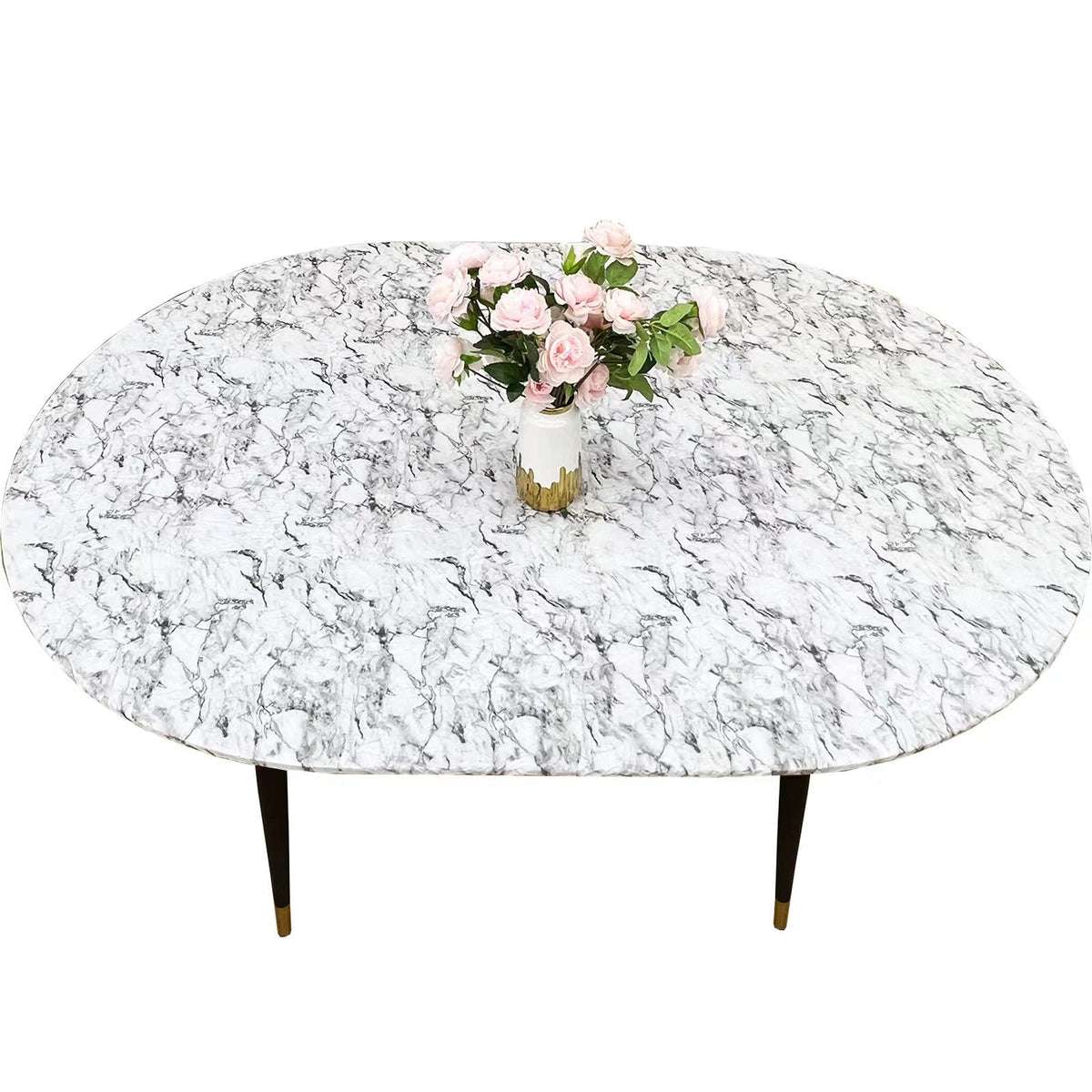 Pioggia oval tablecloth with flannel backing provides secure fit and surface protection.