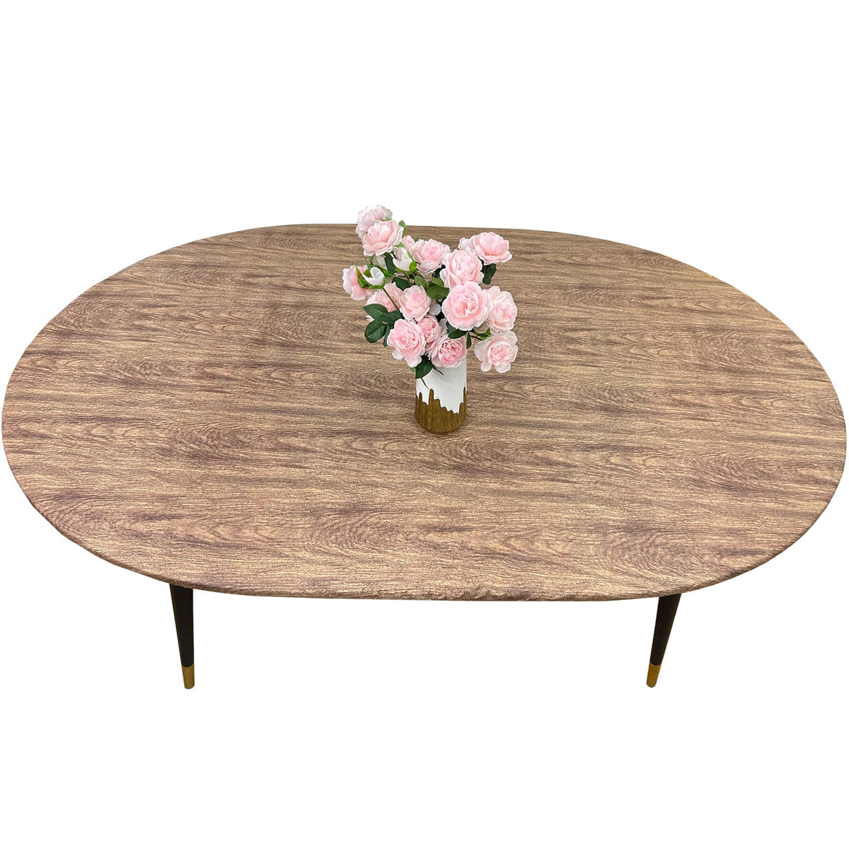 Pioggia oval vinyl fitted tablecloth with flannel backing protects surfaces in any room