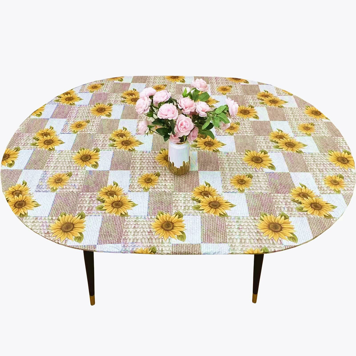 Pioggia oval vinyl fitted tablecloth with flannel backing protects oval tables up to 42x60.
