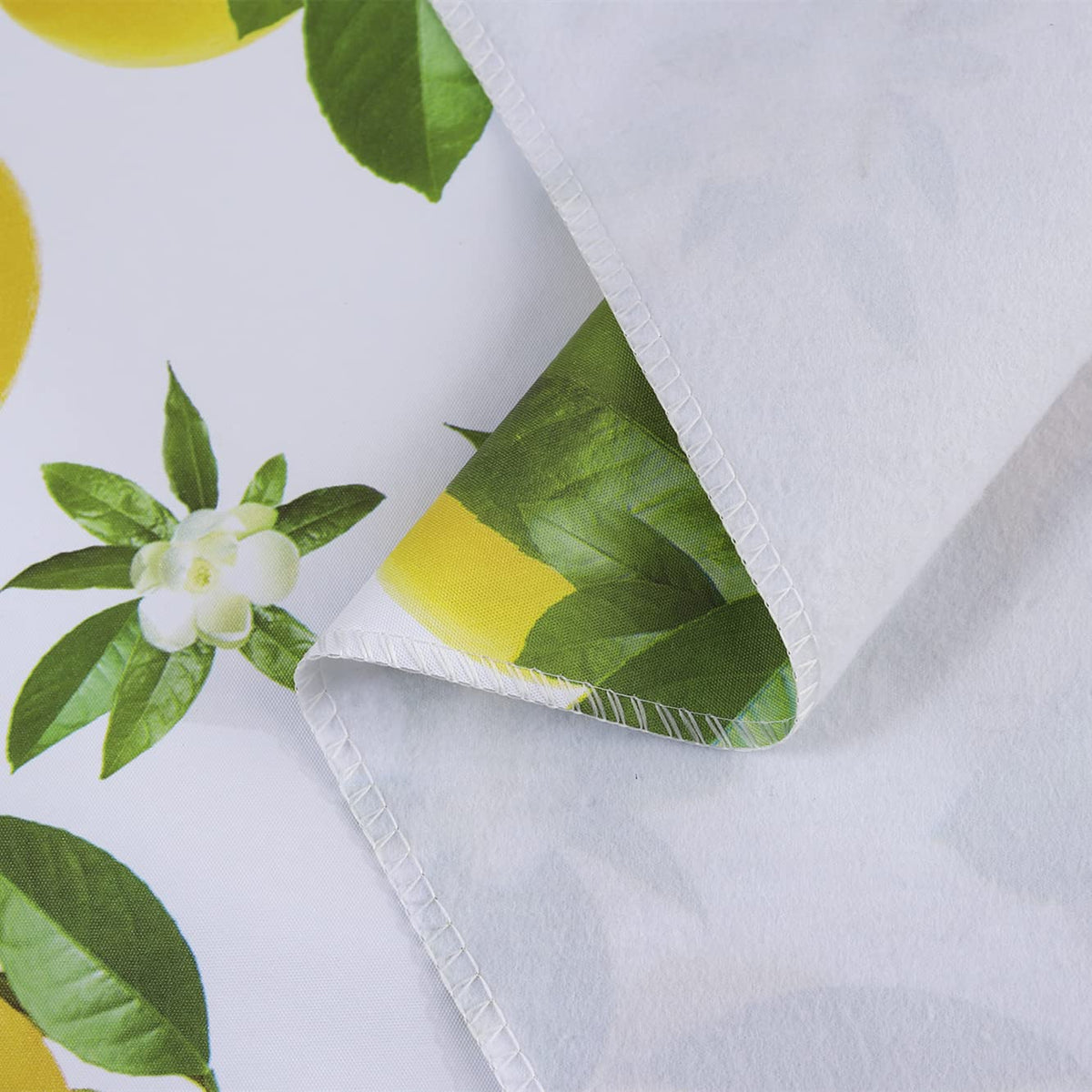 Pioggia tablecloth outdoor dining use highlighting waterproof protection against drinks