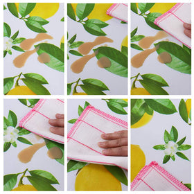 Pioggia tablecloth texture close-up showing durable vinyl surface