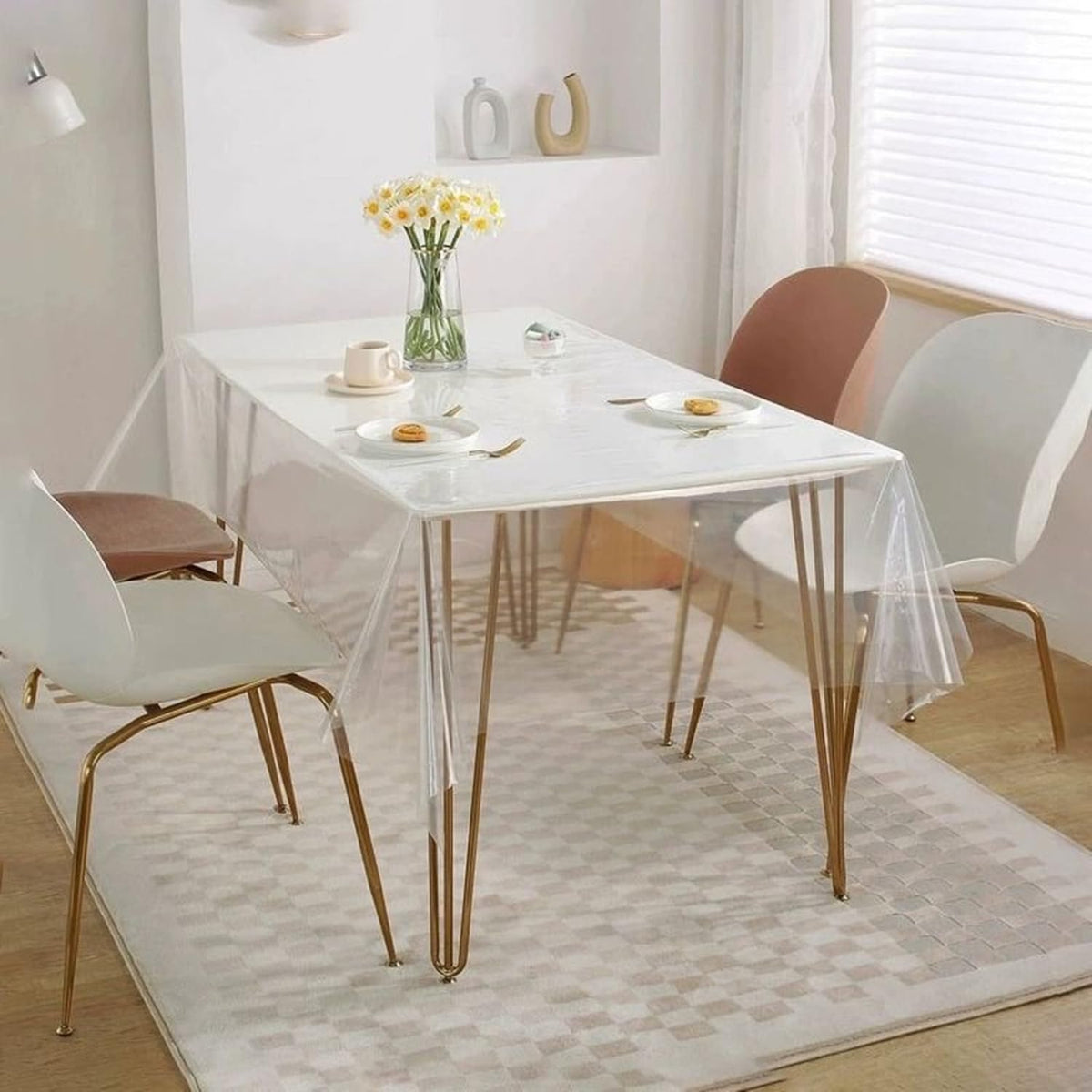 Pioggia waterproof table cover shields surfaces from spills and stains.