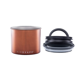 Planetary Design Airscape canister filled with coffee beans on a kitchen counter.
