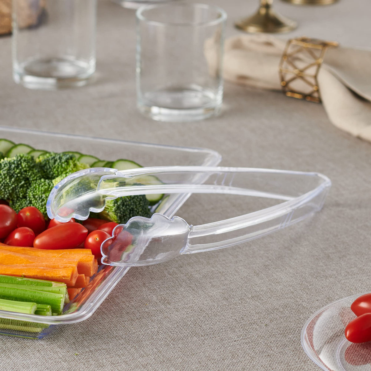 Plasticpro BPA-free clear serving tongs for safe food service.