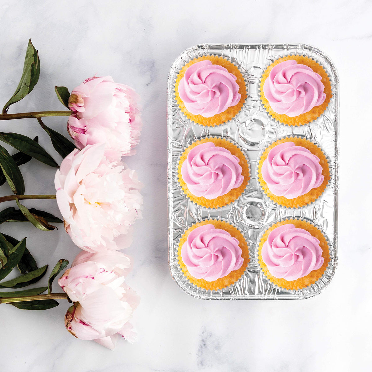 Plasticpro packaging-ready muffin pans for quick party prep.