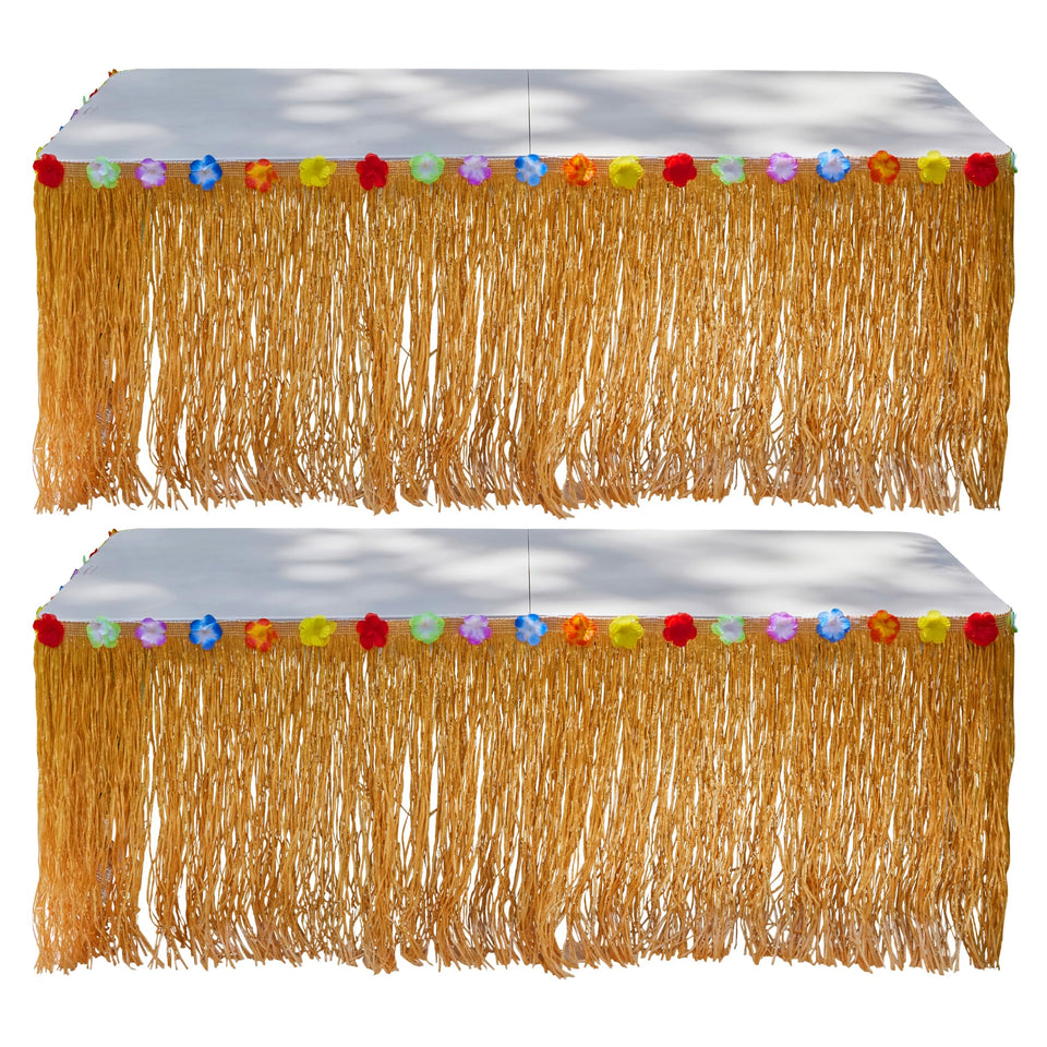 Playbees luau grass table skirt setup on a 9ft table for tropical parties.