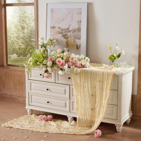 Playieer wedding decor cheesecloth runner complements candles and florals beautifully.