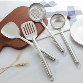 Pleafind space-saving-hanging-holes keep the kitchen organized.