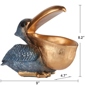 PlivBloom pelican candy dish in gold finish adds playful charm to office or entryway.
