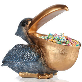 PlivBloom pelican key holder figurine with gold finish enhances desk organization.