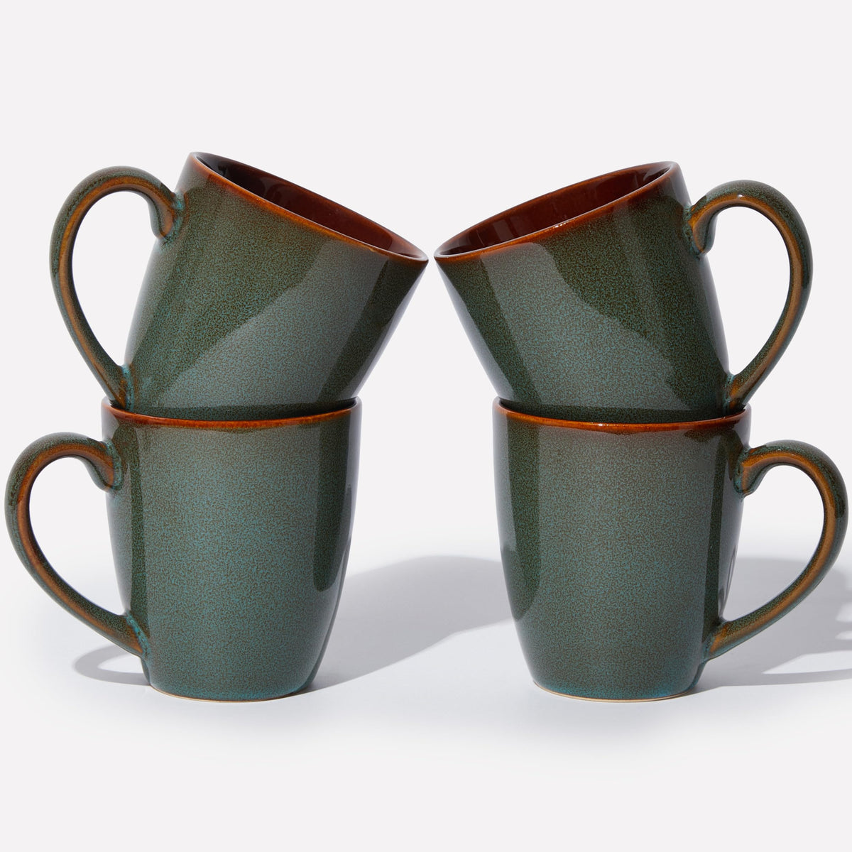 Pokini 14oz coffee mug with ergonomic handle and unique reactive glaze.