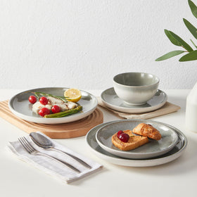 Pokini gradient green dining set laid out on table hints at versatile hosting.