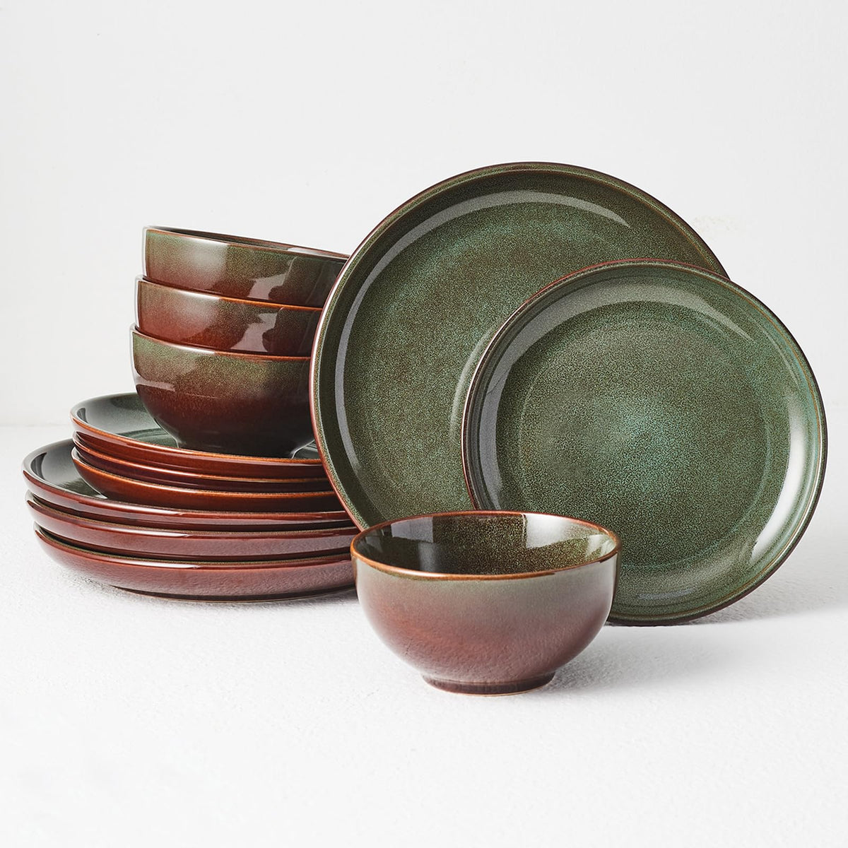 Pokini stoneware 10-inch dinner plates with reactive glaze for unique, vibrant meals.