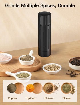 POPWOODS pepper grinder in use over steak showcases effortless seasoning.