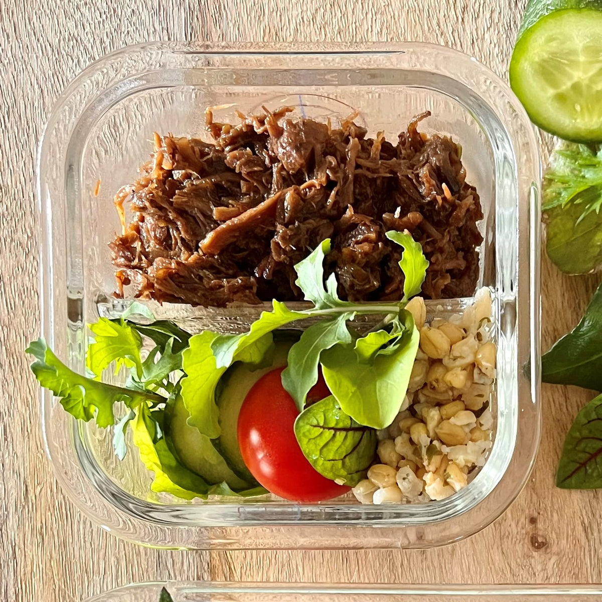 Portion Perfection glass containers tolerate oven-to-freezer transitions for versatile meal prep.
