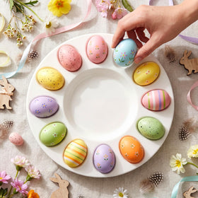 Potchen white ceramic platter displayed with halved eggs for family gatherings.
