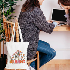 PQV tote in use during grocery run with books and laptop