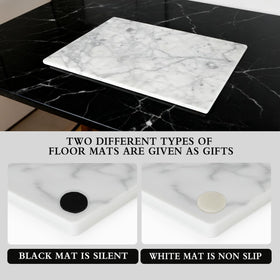 Cheese and charcuterie presentation on a marble board with elegant surface.