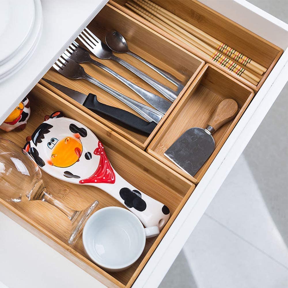 PRATIQUE bamboo drawer organizer close-up shows smooth finish and compact design.