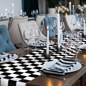 Preboun car-themed table runner enhances racing party decor with minimal setup.