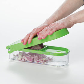 PrepWorks Onion Chopper green/white displayed as dishwasher-safe for easy cleanup.