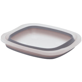 PrepWorks collapsible tub in use washing dishes with raised feet for drainage