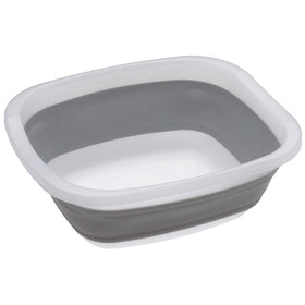 PrepWorks collapsible tub folded for compact storage in a kitchen cabinet