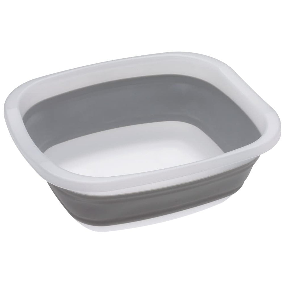 PrepWorks collapsible tub folded for compact storage in a kitchen cabinet