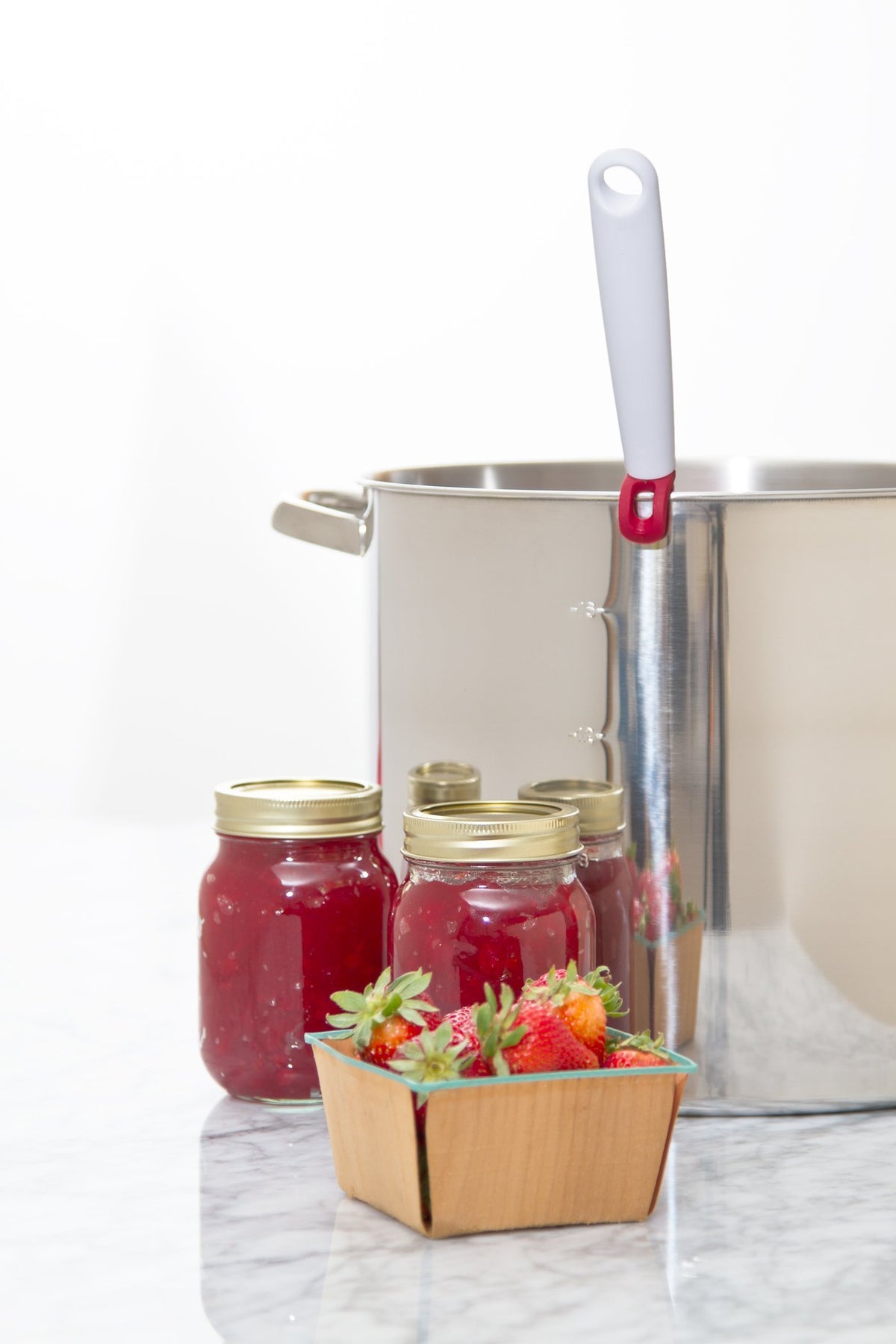 PREPWORKS red scoop is shown in use for efficient portioning.