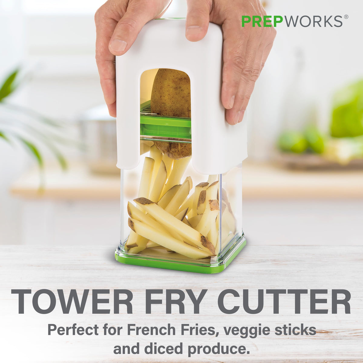 PrepWorks Tower Fry Cutter in action slicing potatoes into fries for quick meals.