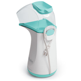 Measuring cup and butter melter accessory ready for flavor topping