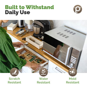 Pristine Bamboo drawer organizer inside a drawer for neat separation.